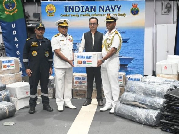 World News | Op Sagar Bandhu: INS Vikrant, INS Udaygiri Hand over Relief Material to Sri Lanka Amidst Cyclone Ditwah