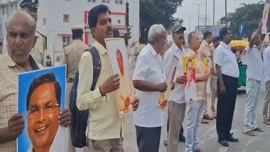 India News | Supporters in Tumkur Hold Puja, Human Chain Urging Congress Not to Replace Karnataka CM Siddaramaiah
