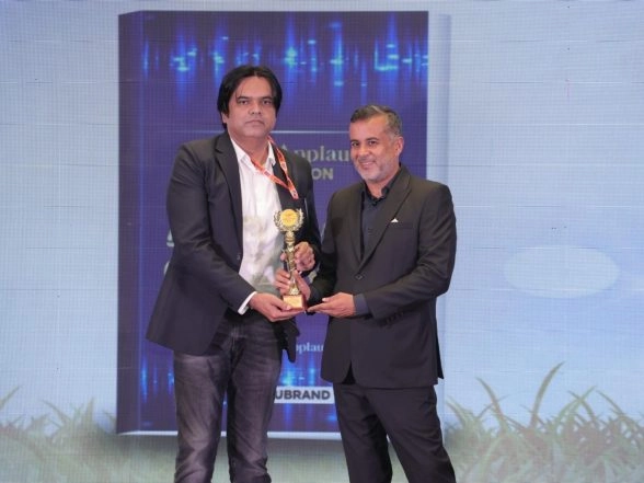 Business News | Amit Kumar Singh Honored with Excellence in Journalism Award 2025-26 by Chetan Bhagat