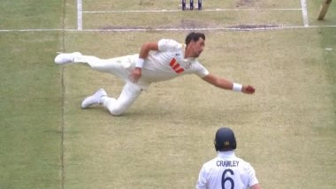 Mitchell Starc Catch Video: Watch Aussie Pacer Take Sensational Diving Catch Off His Own Bowling to Dismiss Zak Crawley During AUS vs ENG 1st Test in Ashes 2025-26