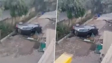 Ghaziabad Road Accident: 1 Killed After Car Crashes Through Railing, Falls off Flyover in Uttar Pradesh (Watch Video)