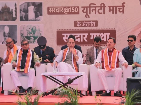 India News | Gujarat: Uttarakhand CM Dhami, Defence Minister Rajnath Singh Attend Sardar Gatha Programme in Vadodara