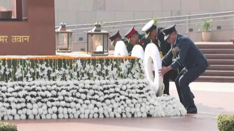 India News | CDS General Anil Chauhan, Navy Chief Admiral Dinesh K Tripathi Lead Wreath-laying Ceremony in Delhi on Navy Day