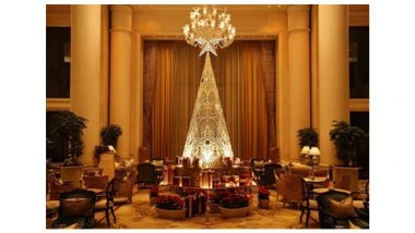 Business News | The Leela Unveils Mirrors Of Hope: Lippan Art Christmas Trees Crafted By Women Artisans