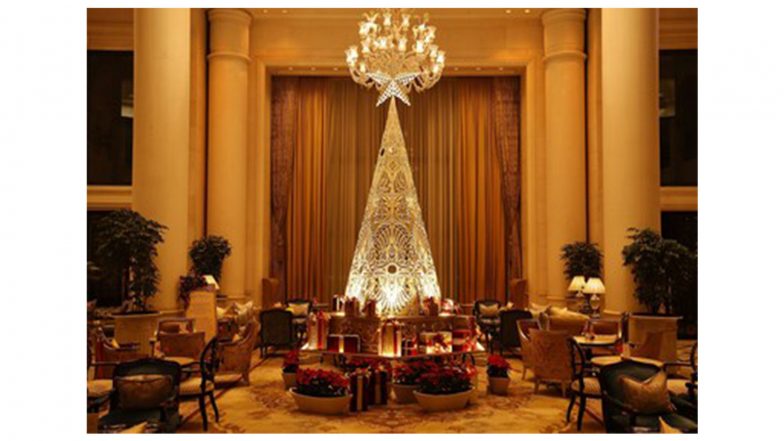 Business News | The Leela Unveils Mirrors Of Hope: Lippan Art Christmas Trees Crafted By Women Artisans