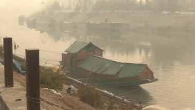 India News | J-K: Cold Wave Continues in Kashmir Valley, Temperature Dips Below Zero