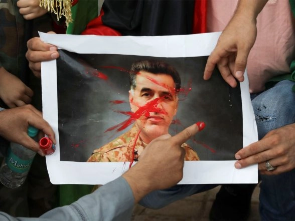 World News | Pakistan's Former Spy Chief Sentenced to 14 Years of Rigorous Imprisonment by Military Court