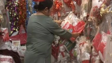 India News | Shops in Guwahati Abuzz with the Christmas Festive Spirit, Storefronts Adorned with Bells and Stars