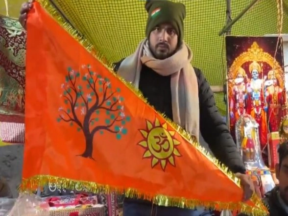 India News | Demand Surges for Ram Mandir Flag in Ayodhya, Shopkeepers Give Special Orders