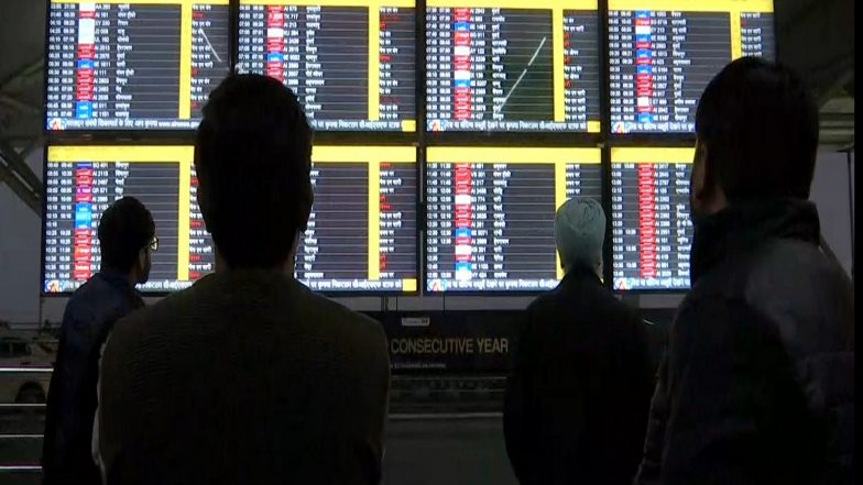 India News | Dense Fog in Delhi Delays Flights, Causing Schedule Disruptions at IGI Airport