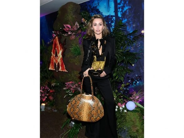 Entertainment News | Miley Cyrus Pitches Music to Filmmakers, Lands Song in 'Avatar: Fire and Ash'