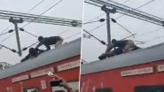 Uttar Pradesh: Man Climbs on Roof of Moving Kashi Vishwanath Express Train at Pratapgarh Railway Station, Rescued by Cop; Video Surfaces Uttar Pradesh: Man Climbs on Roof of Moving Kashi Vishwanath Express Train at Pratapgarh Railway Station, Rescued by Cop; Video Surfaces