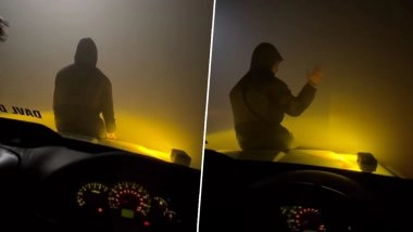'Desi Jugaad': Man Sits on Car's Bonnet to Guide Friend in Zero Visibility; Viral Video Sparks Safety Concerns