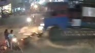Hanumakonda Accident Caught on Camera: Biker Killed After Skidding Under LPG Cylinder-Laden Lorry While Attempting Overtake; Video Surfaces Hanumakonda Accident Caught on Camera: Biker Killed After Skidding Under LPG Cylinder-Laden Lorry While Attempting Overtake; Video Surfaces