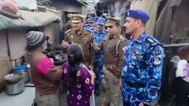 &lsquo;Machine Says You Are From Bangladesh&rsquo;: Ghaziabad Cop Puts Mobile Phone on Man&rsquo;s Back, Claims It Can Detect Nationality (Watch Video)