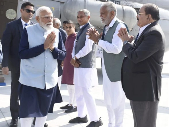 India News | PM Narendra Modi Receives Warm Welcome in Rajkot, Inaugurates Vibrant Gujarat Regional Conference