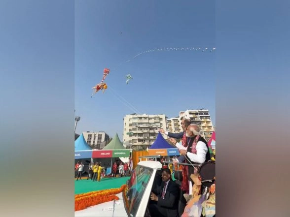 World News | PM Modi, German Chancellor Merz Fly Kite Depicting Lord Hanuman at International Kite Festival