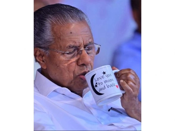 India News | 'Love You to Moon and Back': CM Vijayan's Silent Gesture at LDF Satyagraha Sparks Debate, Seen as Support for Rahul Mamkootathil Case Survivor