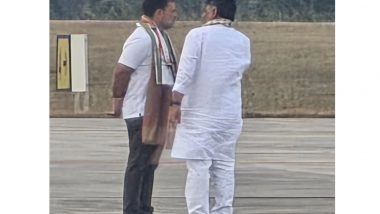 India News | Karnataka: DK Shivakumar Receives Rahul Gandhi at Mysuru Airport Amid Power Tussle