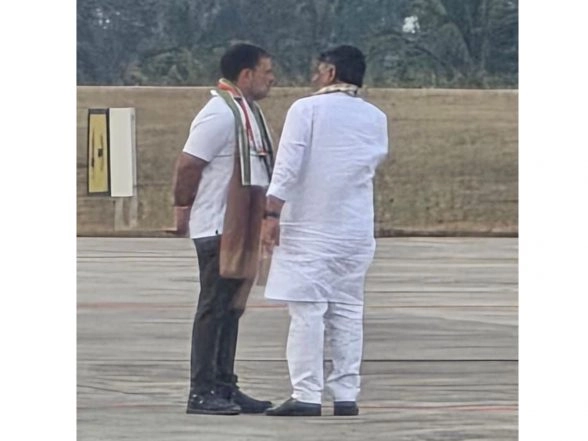India News | Karnataka: DK Shivakumar Receives Rahul Gandhi at Mysuru Airport Amid Power Tussle