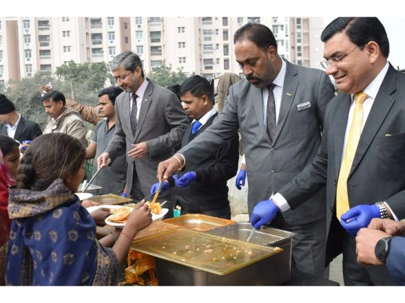 Business News | Radisson Blu Greater Noida Begins 2026 with a Community-Focused Food Distribution Drive