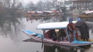 India News | J-K: Tourists Brave Chilly Morning at Dal Lake Amid Cold Wave