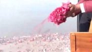India News | UP: Flower Petals Showered on Devotees at Sangam on Mauni Amavasya