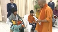 India News | Uttar Pradesh CM Yogi Adityanath Addresses Grievances, Engages with Children at 'Janta Darshan' in Lucknow