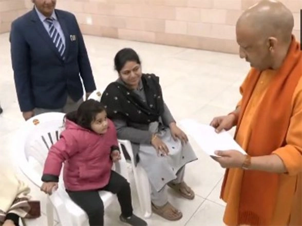 India News | UP: CM Yogi Addresses Public Grievances During 'Janta Darshan', Assures School Admission to Young Girl