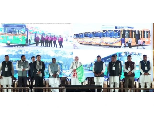 India News | Prime Minister Narendra Modi Dedicates 50 State-of-the-art Electric Buses for Bhavnagar; Gives Flag off from Assam