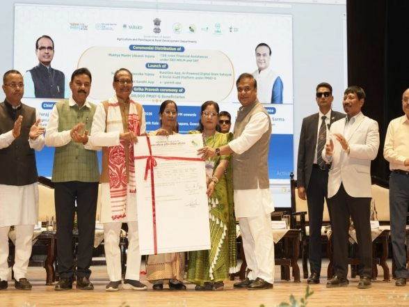 India News | Assam: Shivraj Chouhan Performs Griha Pravesh Ceremony for One Lakh Families Receiving Houses Under PMAY-G