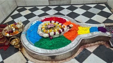 India News | Haridwar: ''Shivling'' at Shri Chandreshwar Temple Adorned with Gulal to Mark Holi Celebration