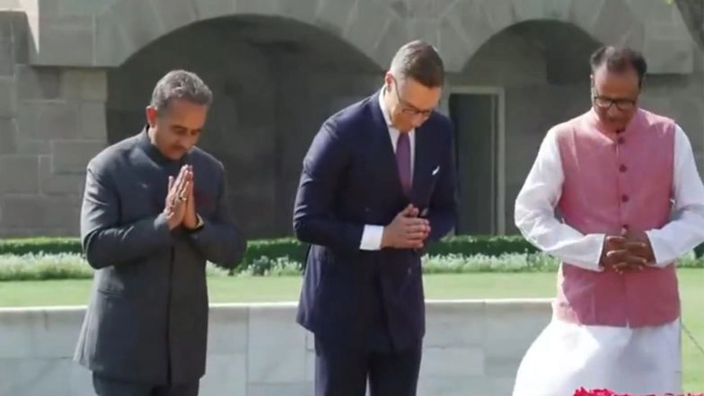World News | Finnish President Alexander Stubb Pays Tribute to Mahatma Gandhi at Rajghat