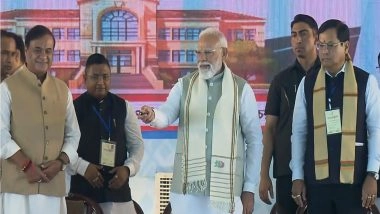 India News | Assam: PM Modi Performs Bhoomi Pujan of Shillong-Silchar Corridor, Lays Foundation Stone of Agriculture College in Karimganj