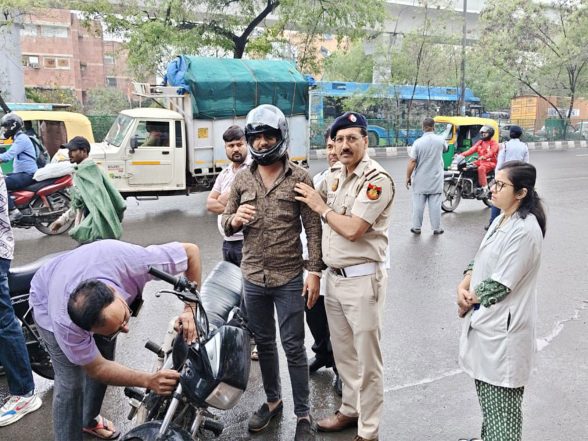 Delhi Traffic Police Tackle Road Safety with Helmets