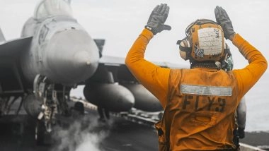 World News | US Centcom Says USS Abraham Lincoln Continues Operations Against Targets in Iran