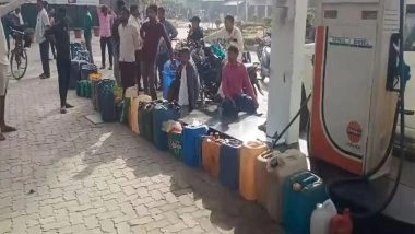 India News | UP: People Queue for Fuel with Canisters in Lakhimpur Kheri Even as Govt Appealed Against Panic Buying