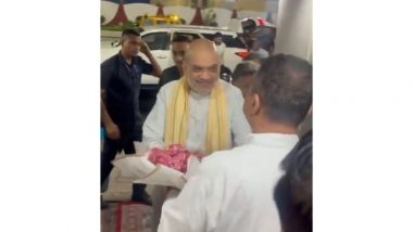 India News | WB: BJP's Suvendu Adhikari Receives Amit Shah at Kolkata Airport