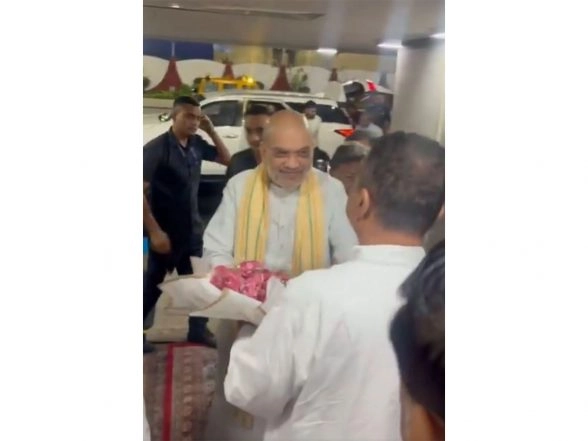 India News | WB: BJP's Suvendu Adhikari Receives Amit Shah at Kolkata Airport