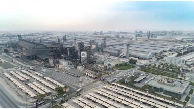 World News | Aluminium Bahrain Confirms Attack Targets on Facility, Two Employees Injured; IRGC Claims Responsibility