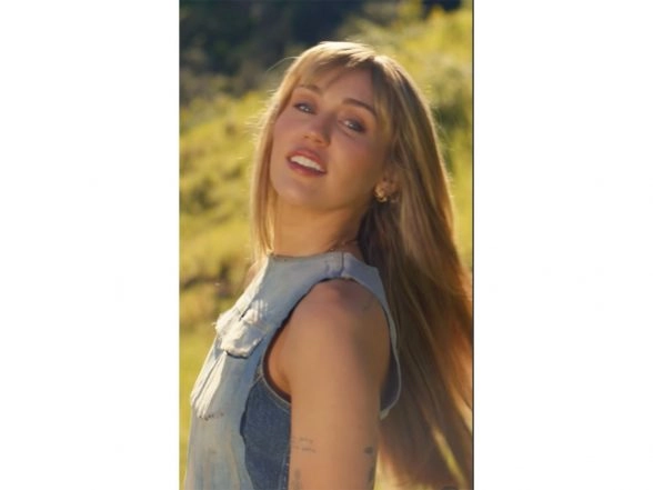 Entertainment News | Miley Cyrus Looks Back at 'Hannah Montana' Days in 'Younger You' Music Video