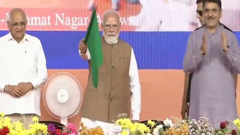 India News | Gujarat: PM Modi Gifts Nation Development Projects Worth over Rs 20,000 Crore, Flags off Khedbrahma-Himmatnagar-Asarwa Train Service