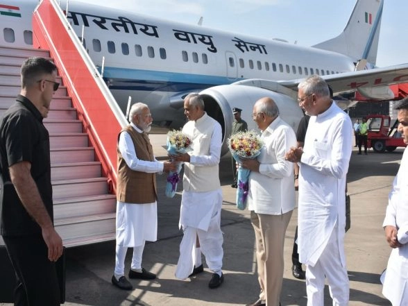 India News | Gujarat Governor, CM, Deputy CM Extend Warm Welcome to PM  Modi at Ahmedabad Airport