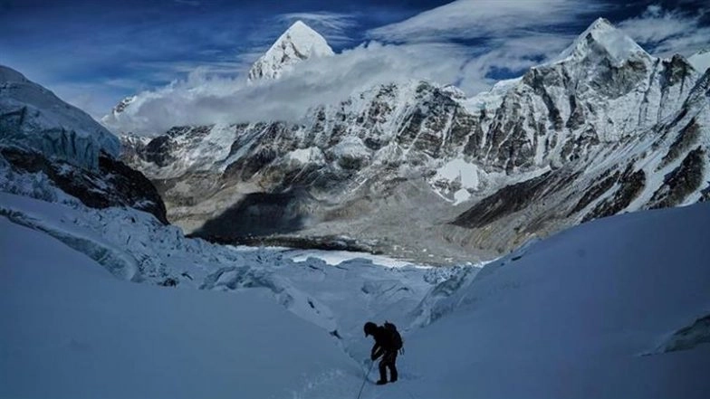 Mount Everest Climbers Halted at Base Camp Due to Massive Unstable Ice Block