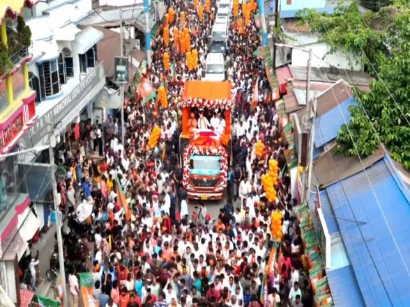 India News | West Bengal: Amit Shah Holds Roadshow in Kaliyaganj Ahead of Assembly Elections 2026