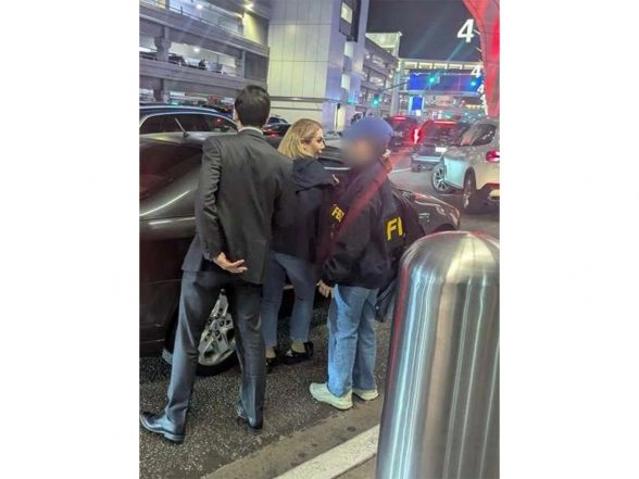 World News | Woman with Glam Lifestyle Held at US Airport; Charged with Brokering Deals for Iran Drones, Bombs, Ammo for Sudan