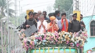 India News | Yogi Adityanath Holds Roadshow in West Bengal's Kalyani in Support of BJP Candidate Anupam Biswas