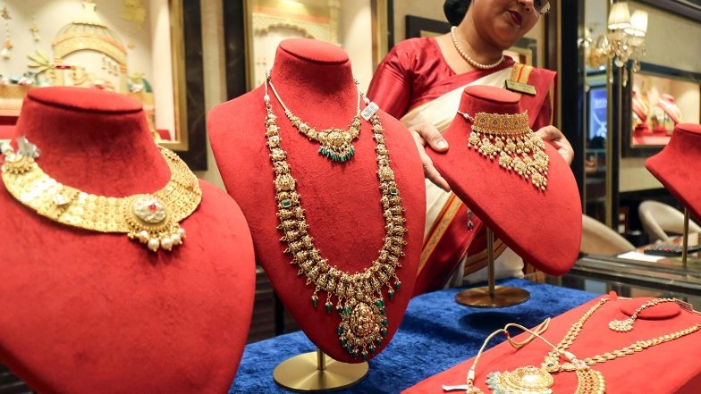 Business News | Amid Record Gold Buying Globally and in India, Consumption Shifts to Investment, Jewellery Demand Declines