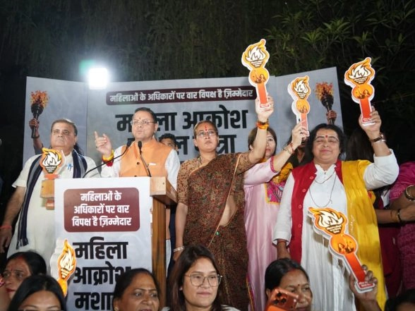 India News | Uttarakhand CM Dhami Joins 'Mahila Aakrosh Mashaal Rally' in Dehradun