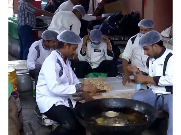 India News | From Aloo Poori to Bengali Rasogulla: Food Preparations in Full Swing at BJP HQ Amid Vote Counting Underway
